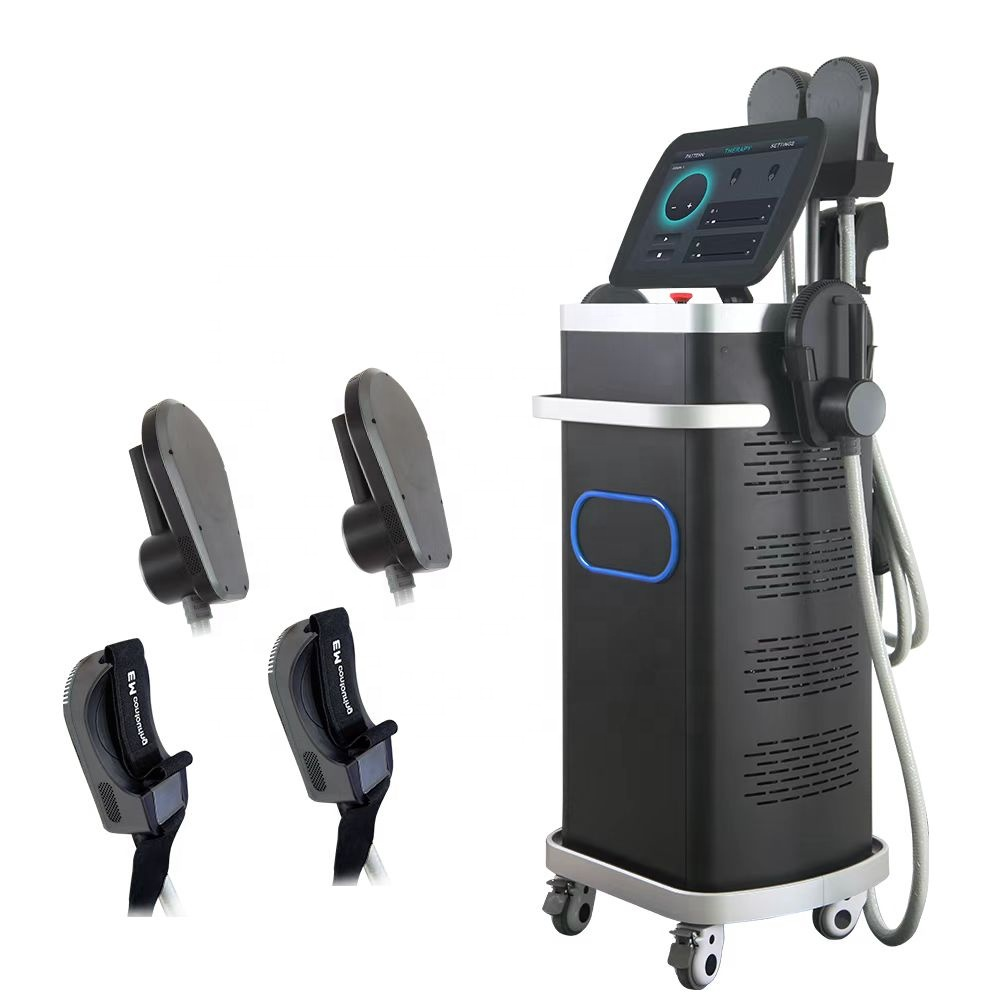 A black and silver mobile beauty device with a touchscreen display, shown alongside four interchangeable attachment heads on a plain white background.