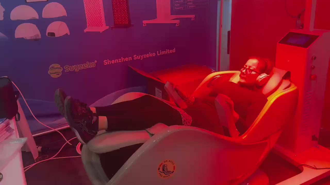 Woman using the Dr.Fuji ProLux 1500 red light therapy panel after a workout in a modern gym